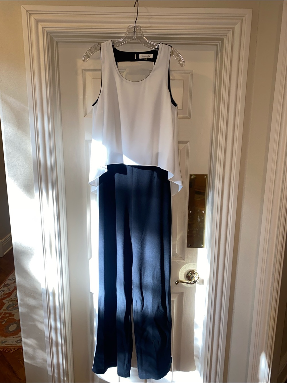 Sugarlips Sleeveless White Overlay Jumpsuit with Black Wide-Leg Pants